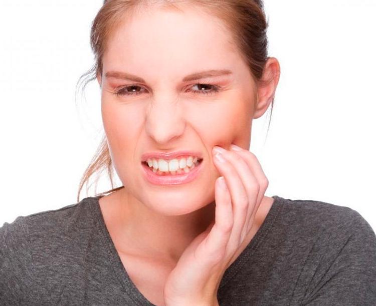Воспаление десны около зуба: причины, возможные методы лечения