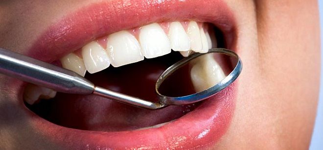 киста на корне зуба лечение